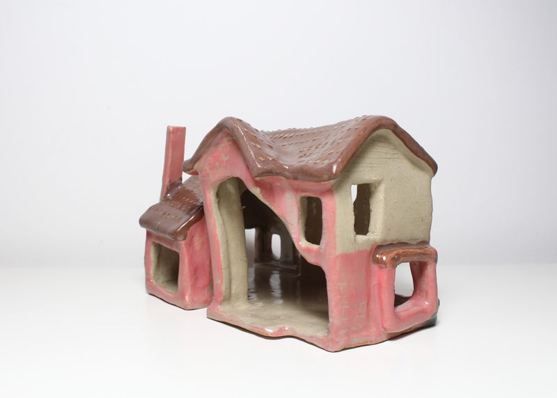 Pink ceramic house, side with chimney