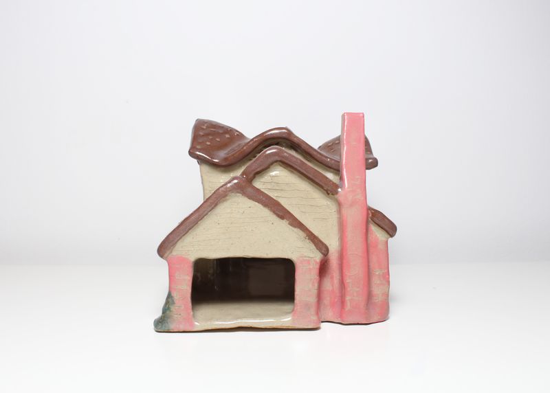 Pink ceramic house, gable end with chimney