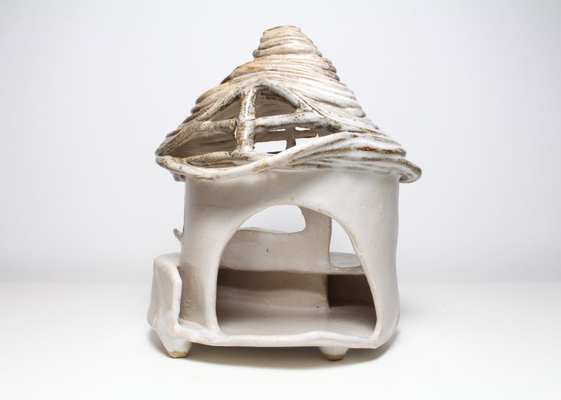 White ceramic house, open side