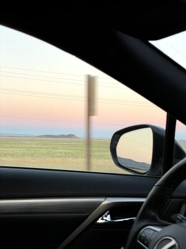Open road seen from a car window
